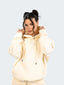 Model wearing oversized CAZBERA baggy hoodie and joggers in beige