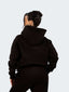 Model wearing oversized CAZBERA baggy hoodie and joggers in black
