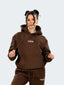 Model wearing oversized CAZBERA baggy hoodie and joggers in brown
